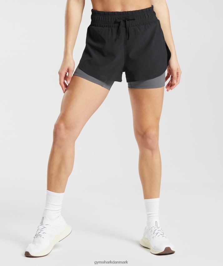 Kvinder Gymshark løber 2 i 1 shorts N4ZDDN40 sort/silhouette grå