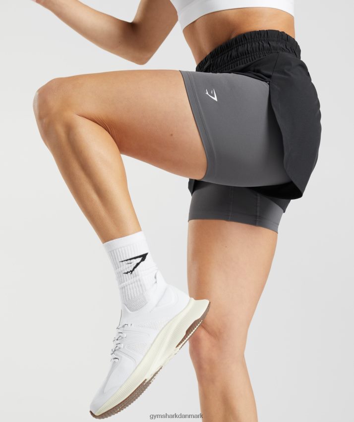 Kvinder Gymshark løber 2 i 1 shorts N4ZDDN40 sort/silhouette grå