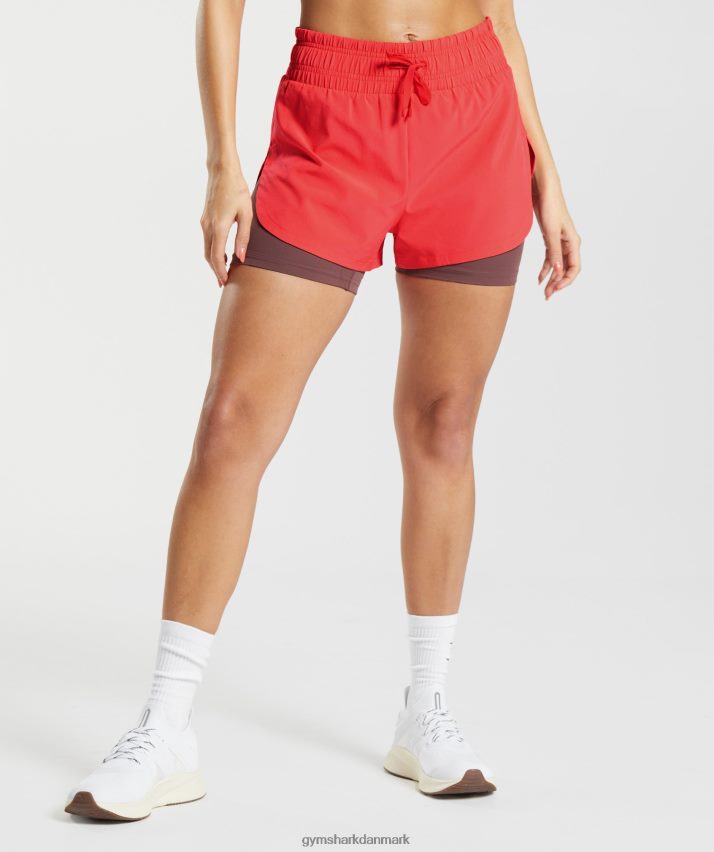 Kvinder Gymshark løber 2 i 1 shorts N4ZDDN51 fluo fed pink/magenta brun