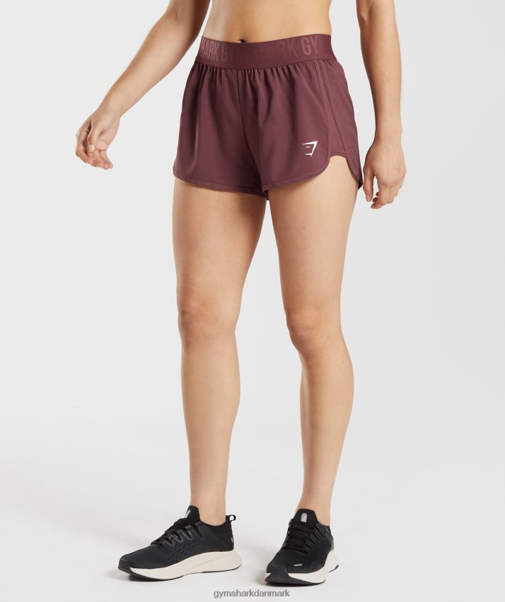 Kvinder Gymshark træningsshorts med løs pasform N4ZDDN76 kirsebær brun