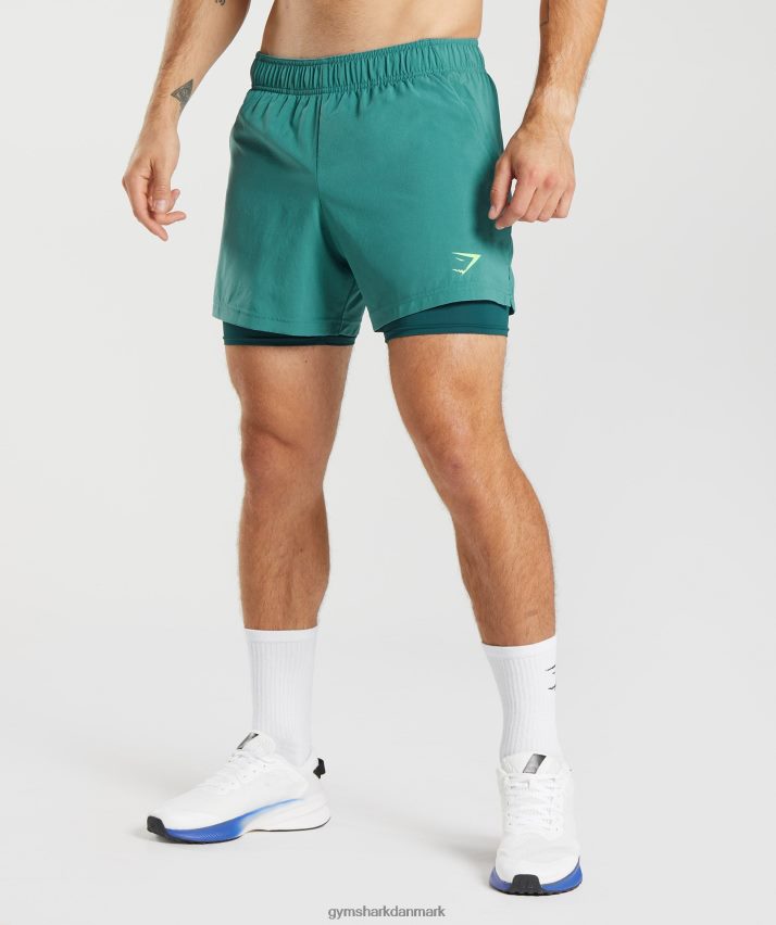 Mænd Gymshark sport 5 2 i 1 shorts N4ZDDN558 skiferblå/vinter krikand