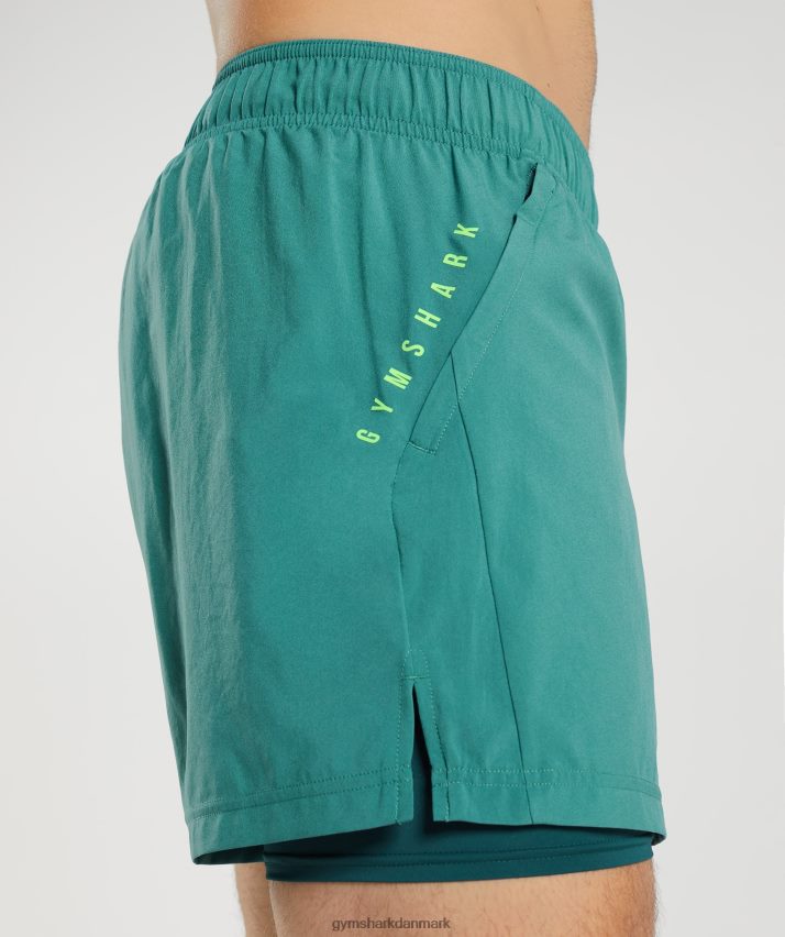 Mænd Gymshark sport 5 2 i 1 shorts N4ZDDN558 skiferblå/vinter krikand