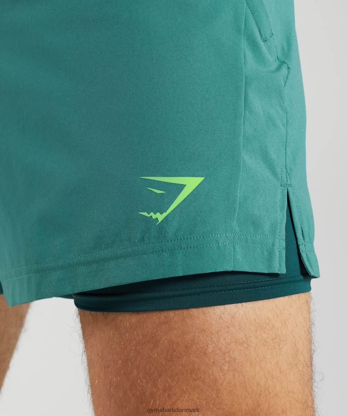 Mænd Gymshark sport 5 2 i 1 shorts N4ZDDN558 skiferblå/vinter krikand