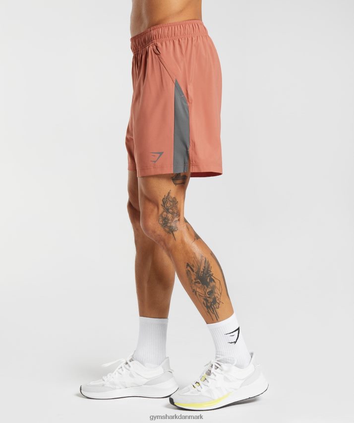 Mænd Gymshark sportsshorts N4ZDDN531 persimmon rød/silhuet grå