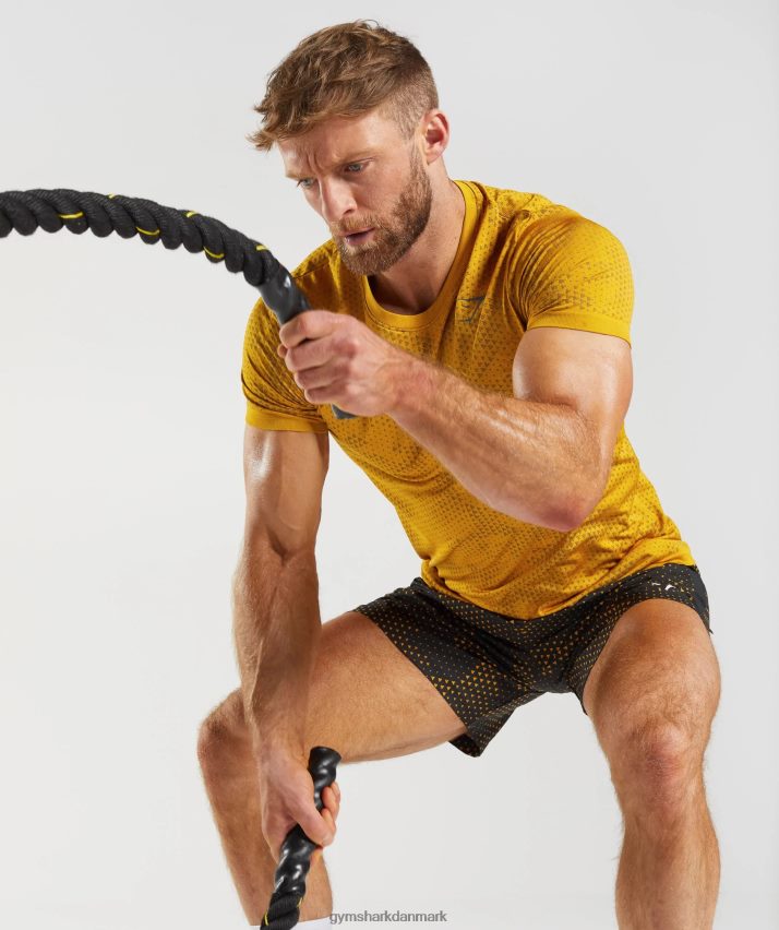 Mænd Gymshark sportsshorts N4ZDDN552 gurkemeje gult print
