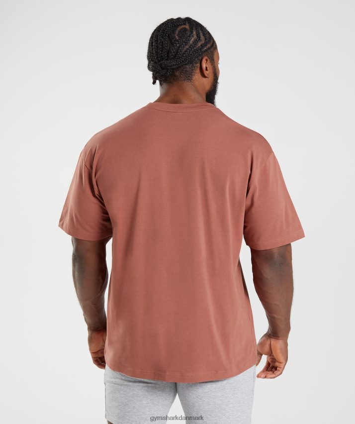 Mænd Gymshark essentiel oversize t-shirt N4ZDDN761 rosenbrun