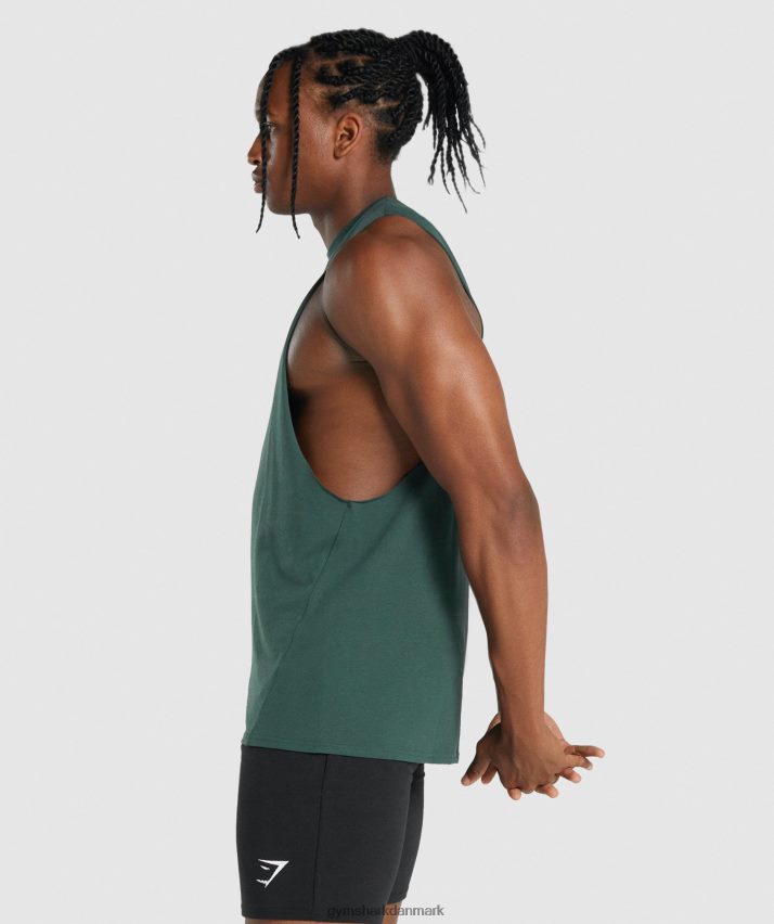 Mænd Gymshark kritisk 2.0 drop arm tank N4ZDDN931 mørkegrøn